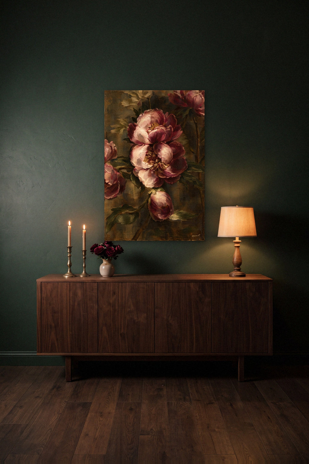 Sargas hidden memory canvas above a walnut sideboard between brass candlesticks and a lamp